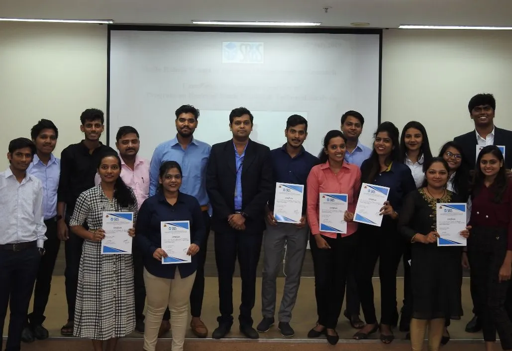 Management students holding certificate with Rahul Sir SRBS
