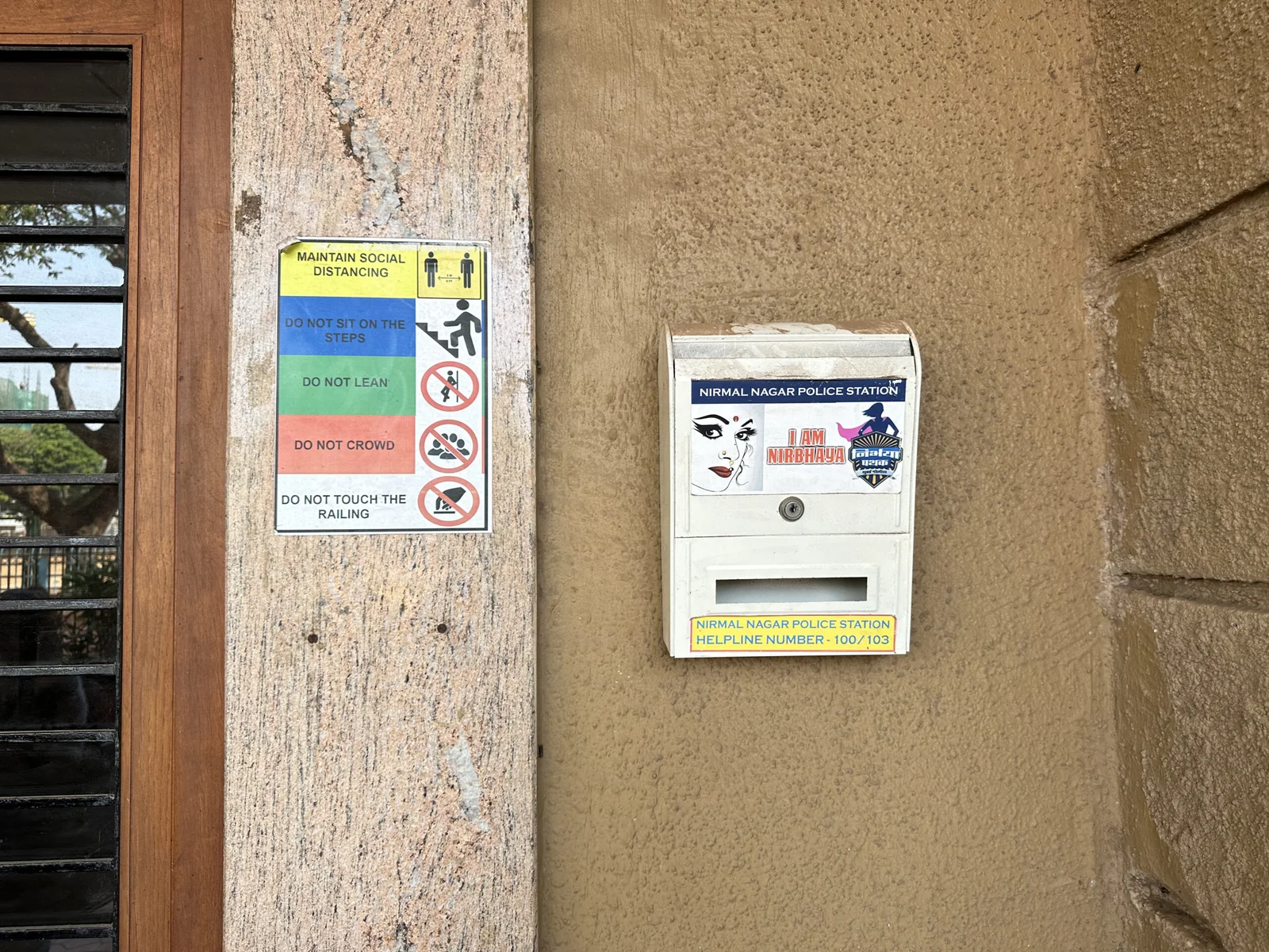 Nirmal Nagar Police station box with helpline number