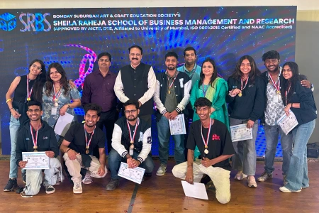 SRBS student reciving certificate and medals in management course